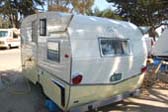 Rear End Shot of 2-tone Yellow and White 1962 Shasta Trailer Coach